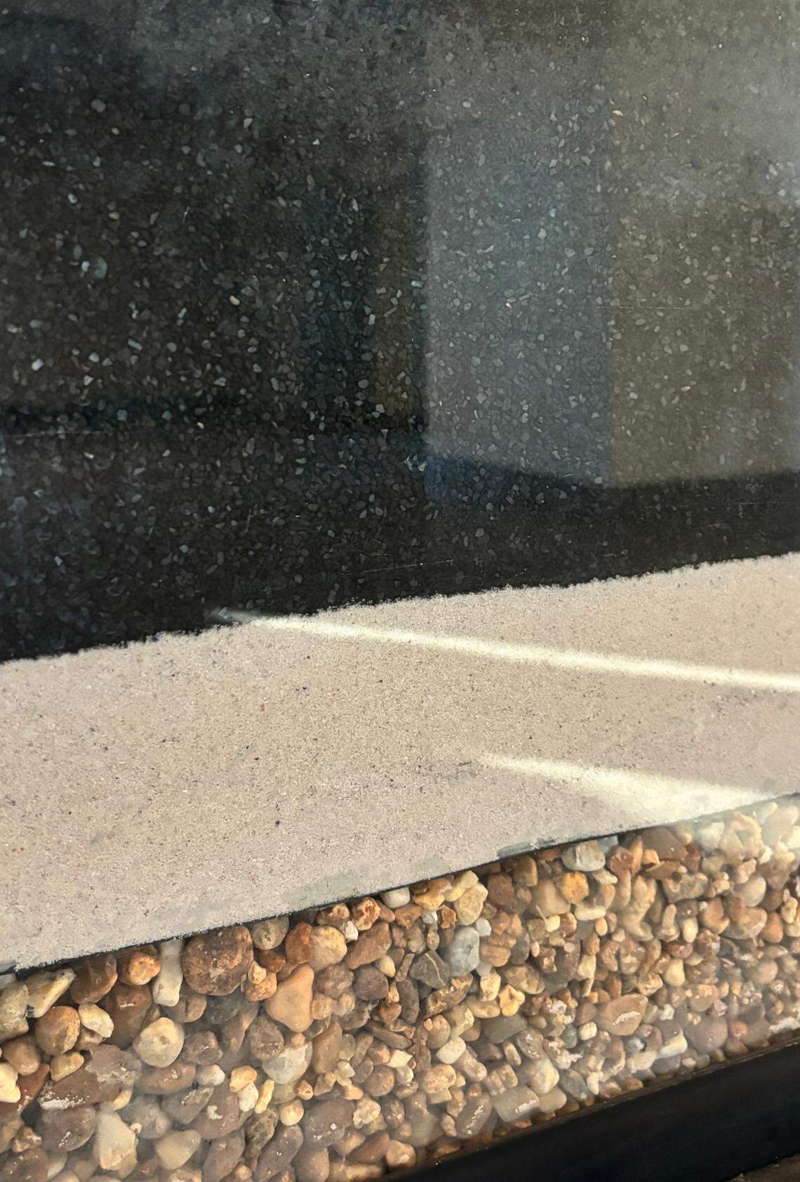 This is what the inside of a GAC filter looks like, with the top-most, thickest layer being the granulated activated carbon which is made from coconut shells.