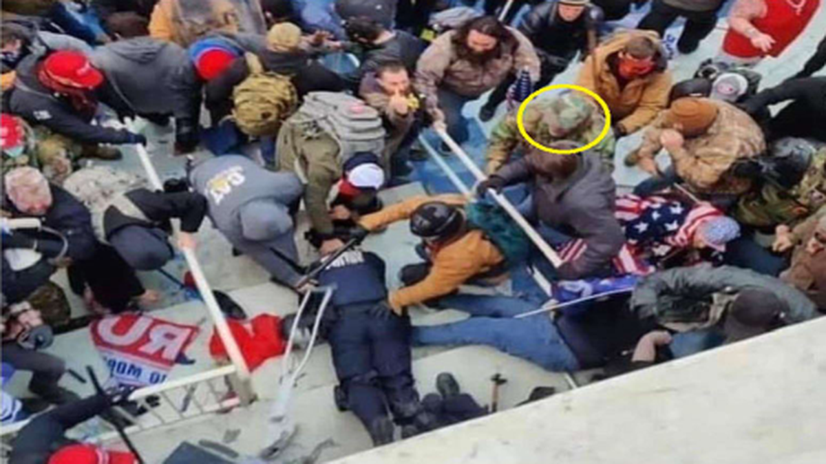 Michael Bradley of Forsyth was captured on camera watching other rioters beat a Capitol officer with their hands, a baton, a crutch and a flagpole at the Lower West Terrace on Jan. 6, 2021, according to prosecutors and court documents. He was convicted of multiple felonies for his involvement in the riot.