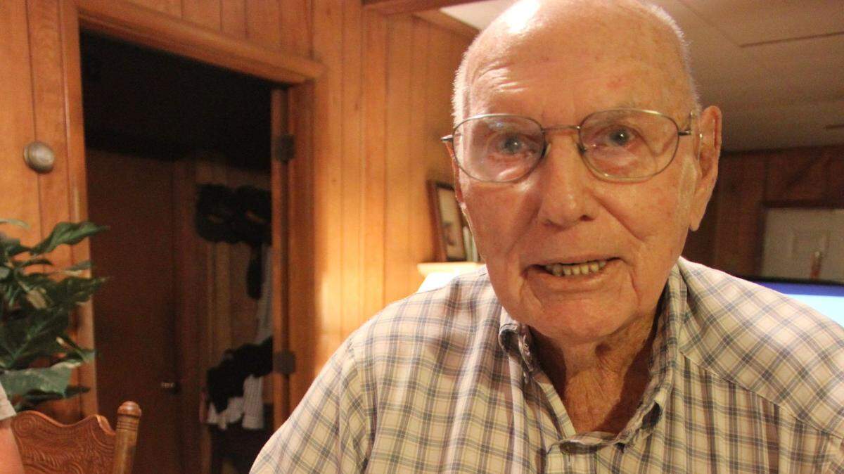 World War II veteran John Knowles, of Bonaire, shows the Purple Heart and campaign ribbons he received for his service. Knowles efforts to find his Army buddies on Facebook has gone viral.