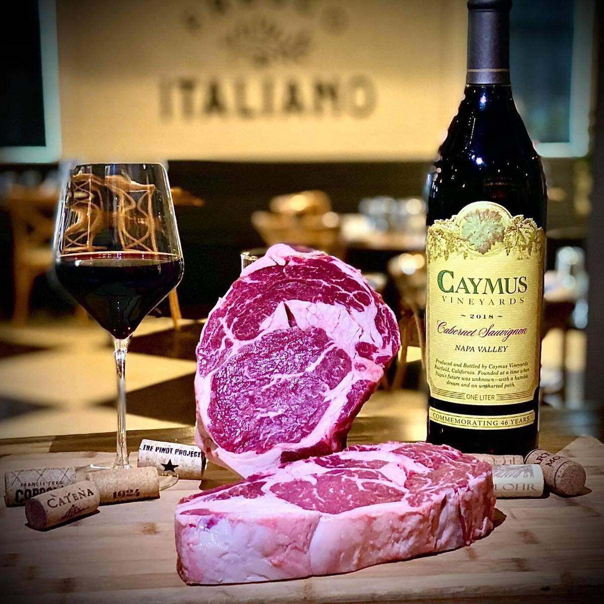 A 100% black Angus ribeye steak from Creekstone Farms that’s hand cut in house and aged for 28 days at Fresco Italiano in Tifton. The wine is our Caymus 2018 from Napa Valley. The restaurant’s owners are opening a Fresco Italiano in Warner Robins.