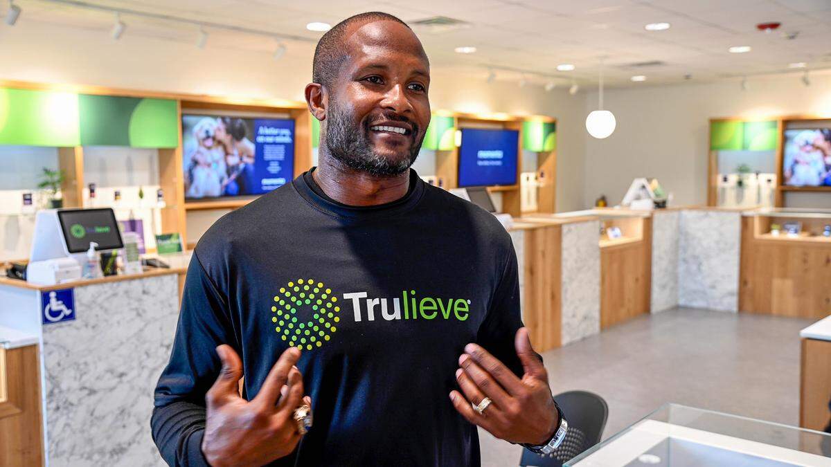 Trulieve Georgia Chief Diversity Officer & Pro Football Hall of Famer Champ Bailey speaks with the media Wednesday while visiting the Trulieve Macon Dispensary on Riverside Drive.