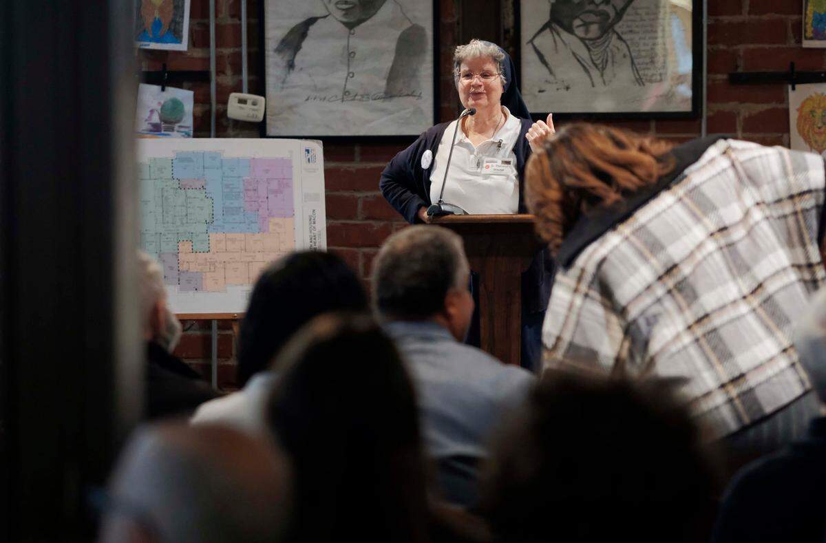 Sister Theresa Sullivan thanked community members for their support of the Daybreak Center during a Tuesday reception. The center is in the midst of shifting more resources to supportive housing for the chronically homeless.