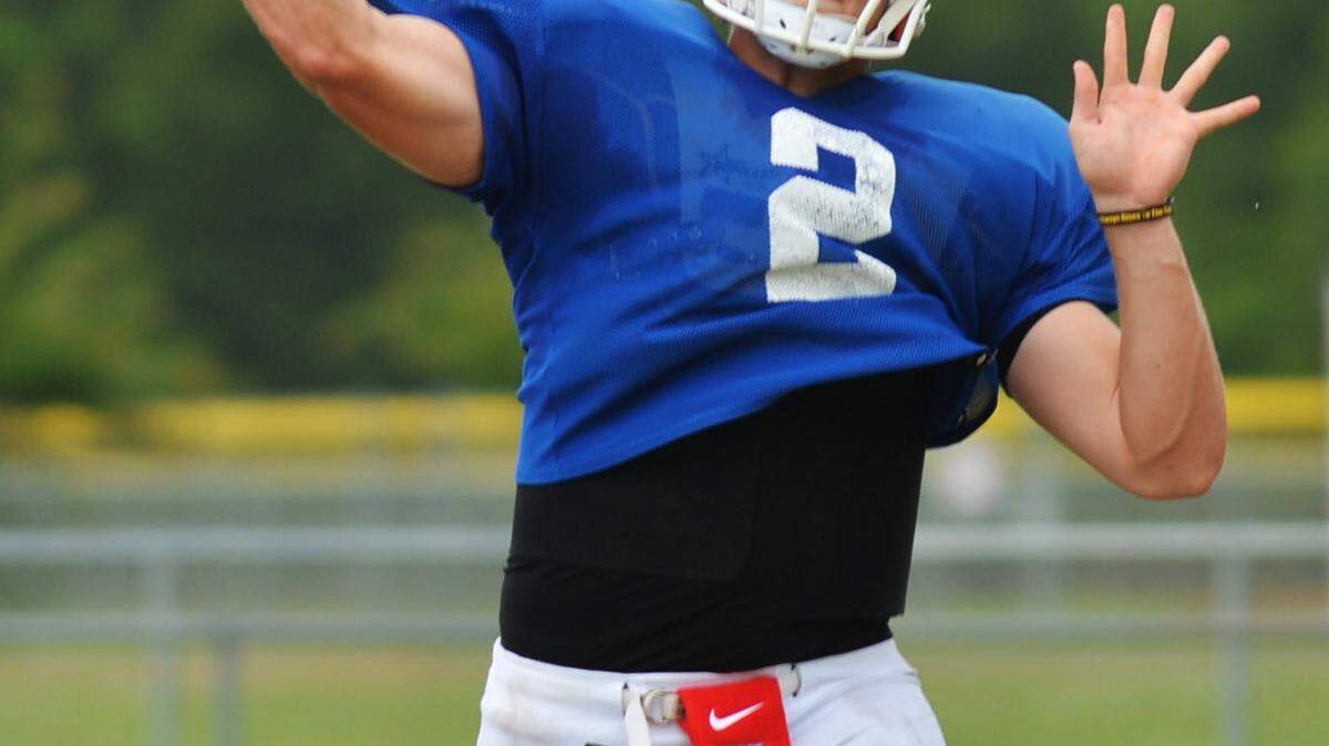 BEAU CABELL and GRANT BLANKENSHIP/THE TELEGRAPHVeterans quarterback Logan Byrd, left, has committed to North Carolina, while Houston County quarterback Jake Fromm is a junior who is among the top quarterbacks in the Class of 2017. The former Little League teammates go at it Thurday night at McConnell-Talbert Stadium.