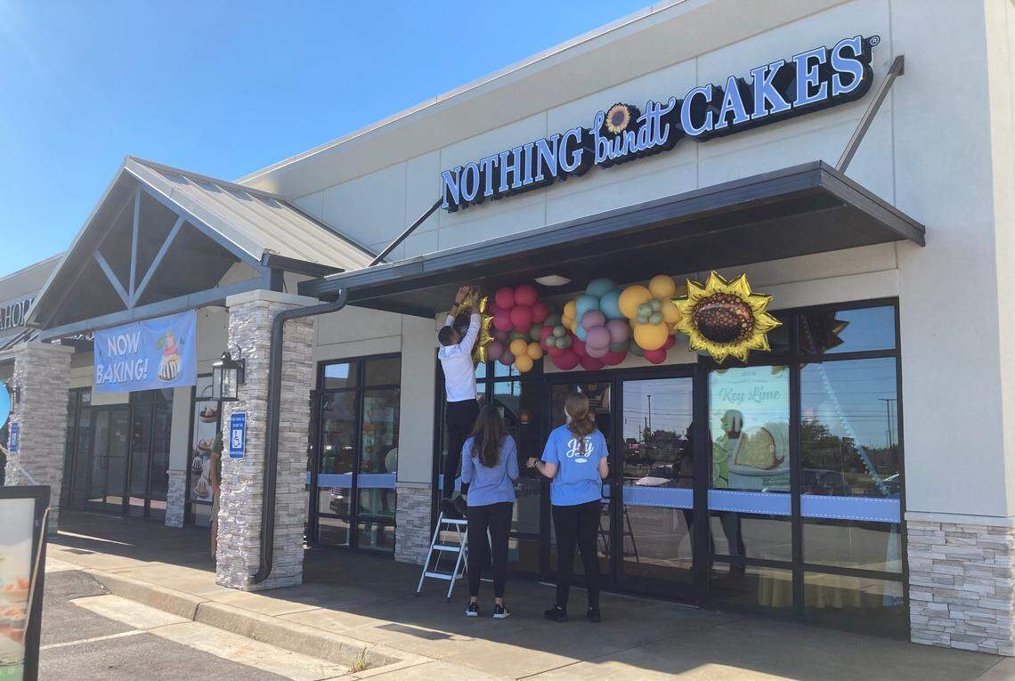 Finishing touches are put in place just before the opening of Nothing Bundt Cakes at 810 Ga. 96, Suite 1400, in the Century Market Plaza in Warner Robins.