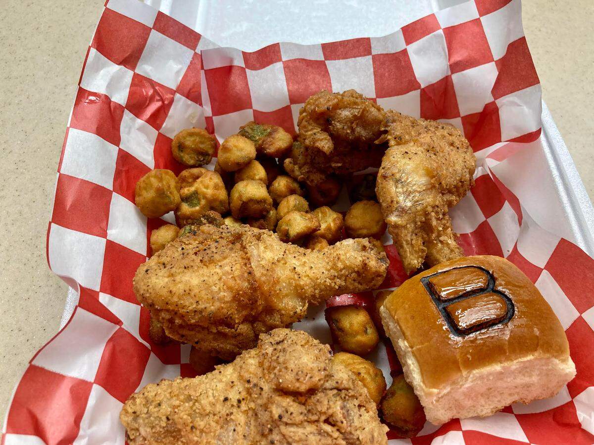 Fried chicken, fried okra and a biscuit at the Big Bird Shack, a new walk-up restaurant also serving up fried fish, hamburgers, red beans and rice and more inside the Houston County Galleria at 2922 Watson Blvd. in Centerville.