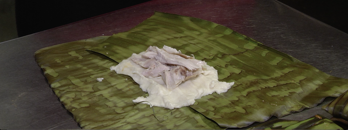 Oaxaca tamales at Tzango are made with roasted banana leafs filled with masa and meat.
