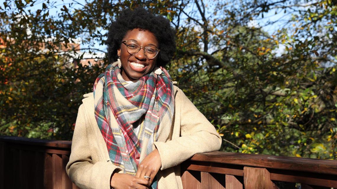 Judah David Creations owner Darice Oppong poses on the back porch of The Web on Wednesday, Dec. 11, 2024, in Macon, Georgia. Oppong started her crochet small business Judah David Creations in January 2024 after learning to crochet after the loss of her son. Now, she sells products and leads classes teaching people the skill.