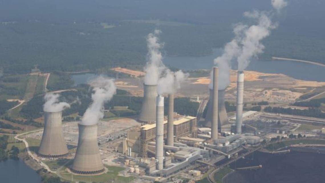 Coal fired power plants like this one release carbon that contributes to global warming.