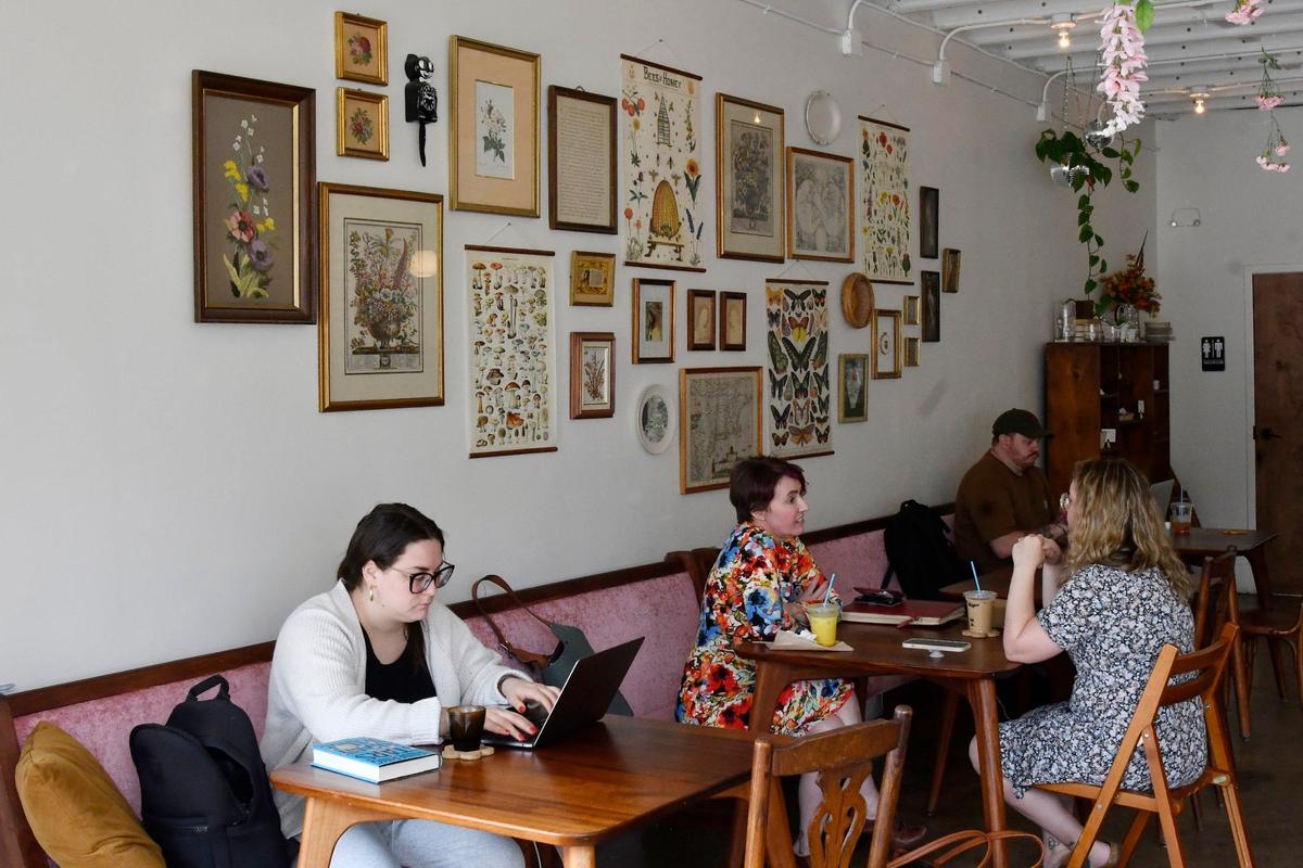 Patrons sit inside of Oh Honey Baking Co. on Thursday, May 23, 2024, in Macon, Georgia.