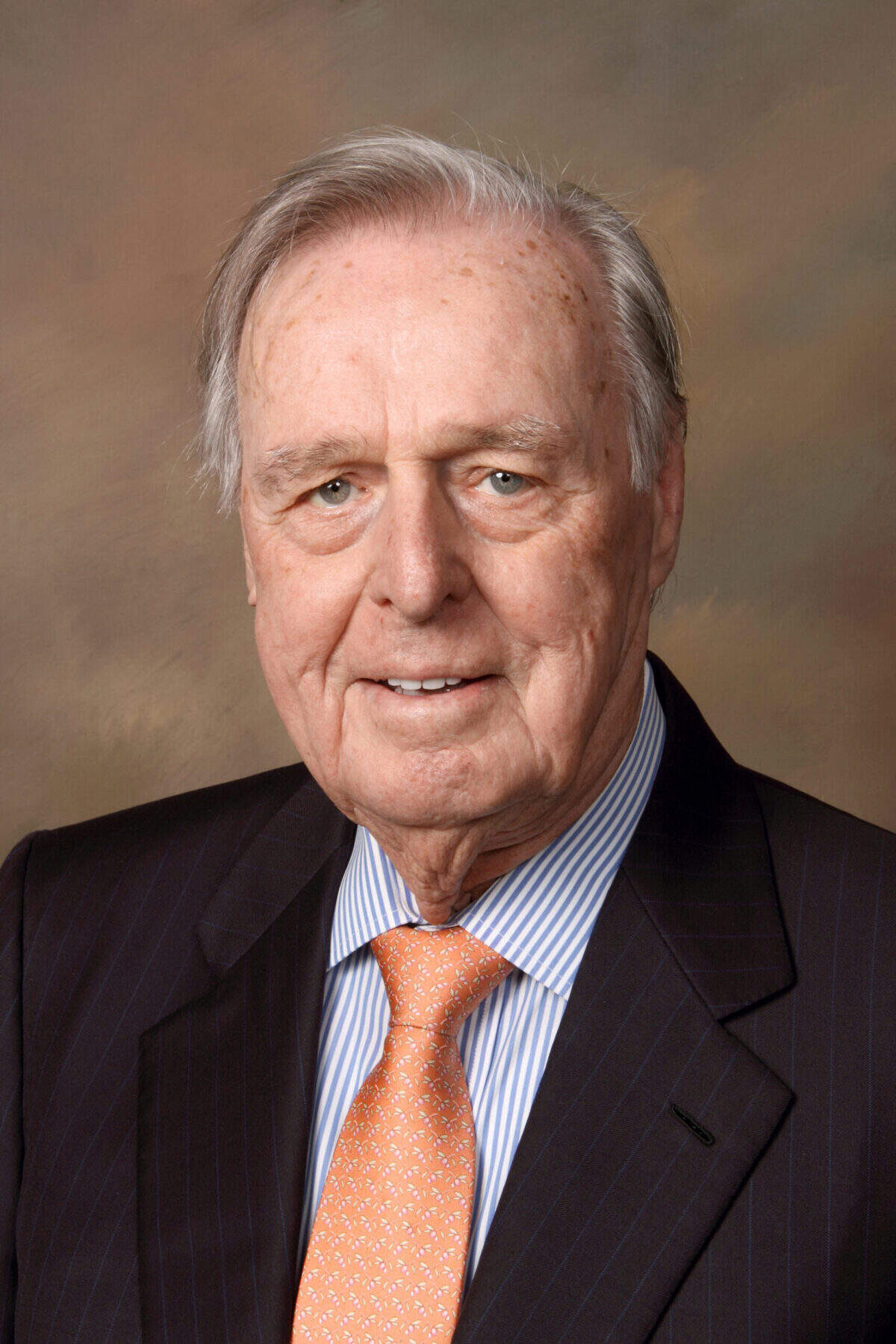 J. Reginald “Reg” Murphy, former journalist for The Telegraph, The Atlanta Constitution and many other outlets, smiles in a headshot. He died on Saturday, Nov. 9, 2024.