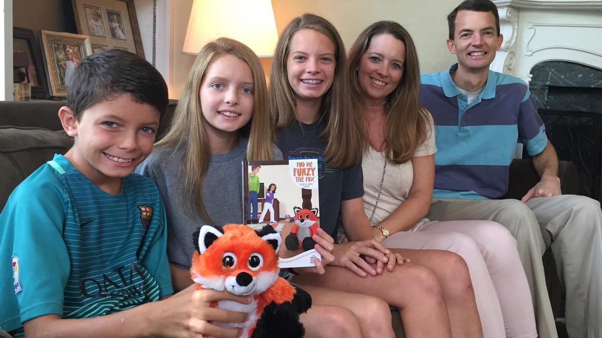 Bryan Scott and his wife, Julie, have launched a new company called Worthwhile Pursuits, LLC. The first of what they hope will be a line of products is a children’s book, “Find Me, Funzy The Fox.’’ The Scotts, at right, are pictured with their children, from left, Asa (holding Funzy Fox), Brynn and Avery.