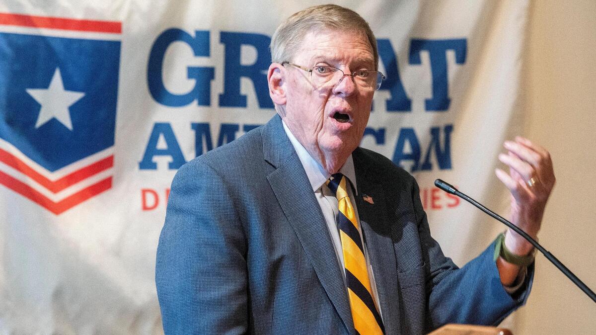 U.S. Sen. Johnny Isakson speaks Thursday during a 21st Century Partnership quarterly meeting at the Museum of Aviation.