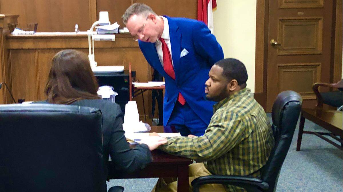 Keith Beddingfield Jr., right, confers with his defense team, lawyers Keagan Waystack, left, and Gregory L. Bushway in Bibb County Superior Court, where Beddingfield was on trial this week in the February 2018 shooting death of Javaris A. Brown.