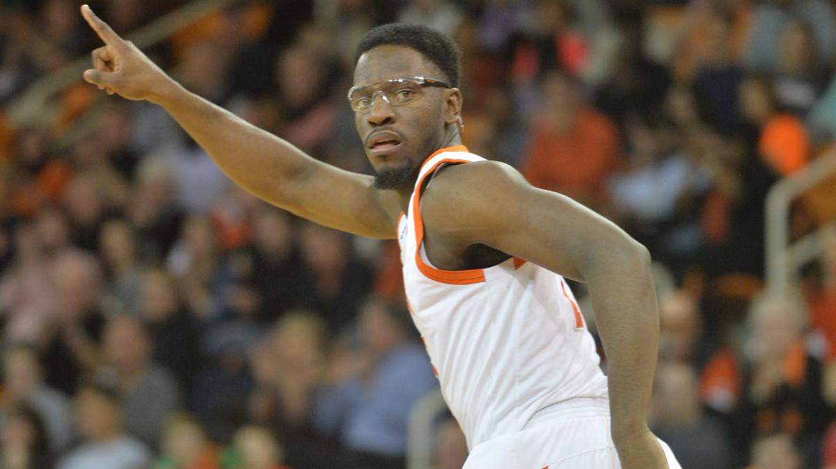 BEAU CABELL/THE TELEGRAPH 
 Macon, Ga., 01/14/2016: Mercer's Lawrence Brown heads back for defense after making a first half basket against Furman.