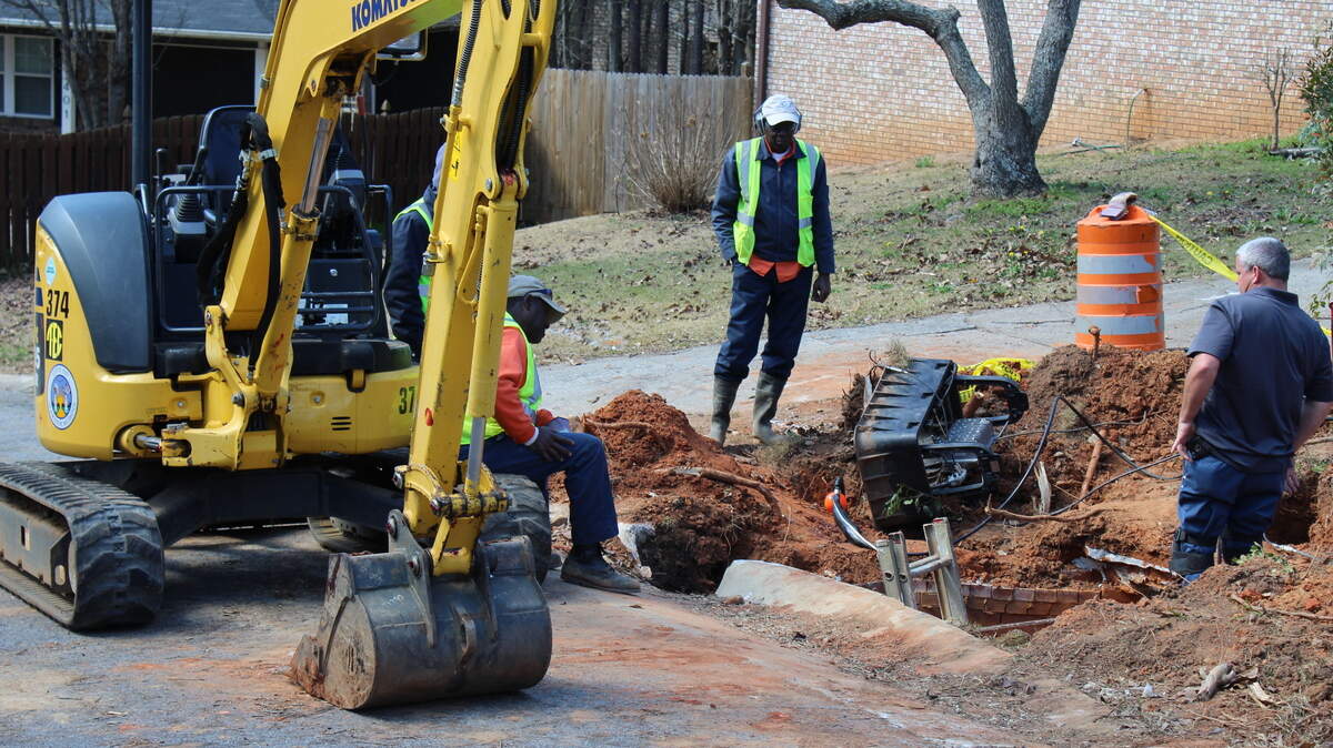 Warner Robins utility workers get started on a repair on Westcliff Circle on Thursday. The repair will close that portion of the street for a week.
