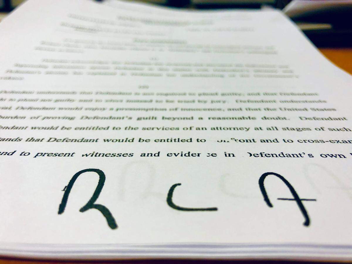 Richard Charles “Chucky” Allen III’s initials on a page of his plea agreement.