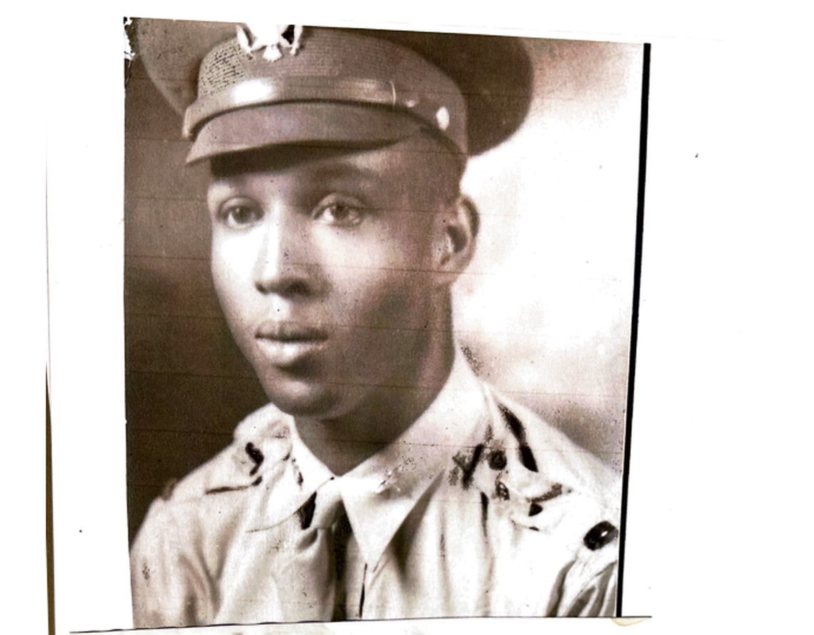A photograph of Richard Davis in uniform at Tuskegee Air Field in Tuskegee, Alabama. Davis completed his training at Tuskegee in August 1942 as part of the fifth class of African American Army Corps Pilots, according to the Tuskegee Airmen National Historic Site.