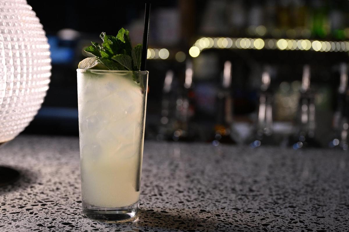 The Kiwijito sits on the counter at The Lounge at JBA on Wednesday, June 4, 2025, in downtown Macon, Georgia. The drink was a part of JBA’s summer cocktail menu last year and consists of white rum, kiwi syrup, lime, mint leaves and soda water.