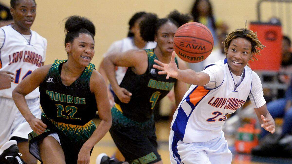 Central’s Brooklynn Talton (23) stretches for a loose ball during the Chargers’ 49-23 first round playoff win over Monroe Saturday.