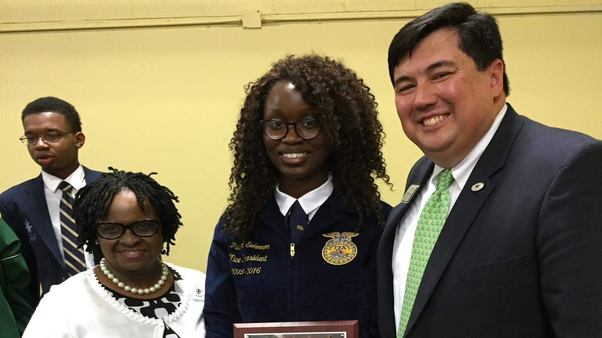 Rachel Solomon, center, is pictured with her FFA adviser Lula Curry-Williams and Bibb County CTAE Supervisor Charles Baima.