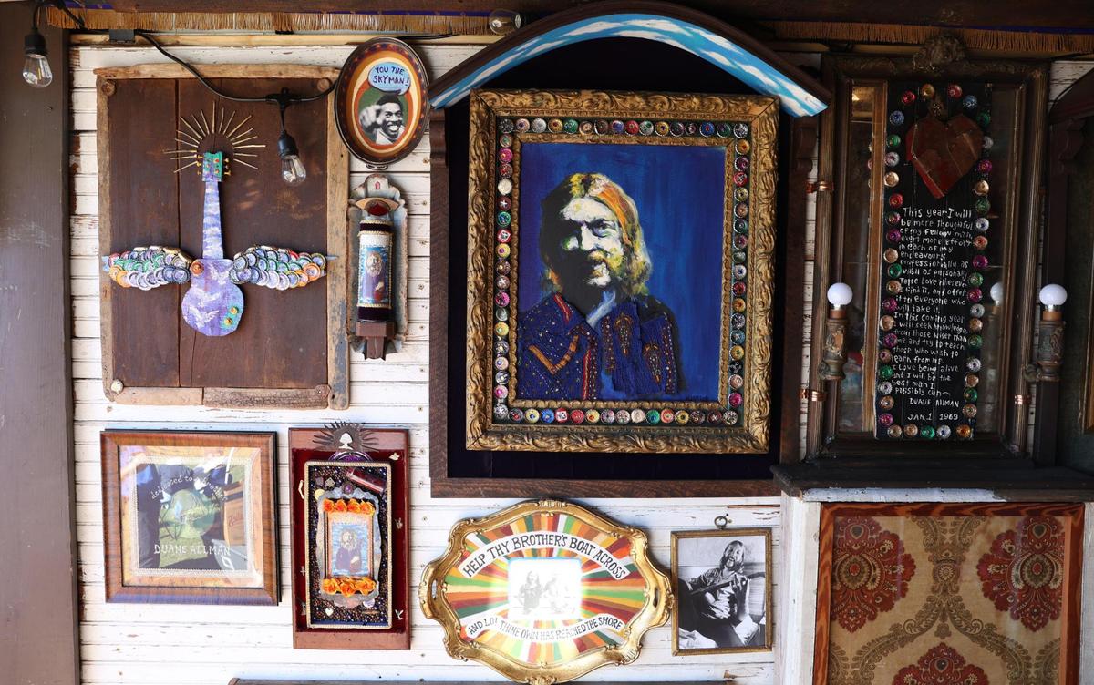 Artwork created by John Mollica, or “Johnny Mo,” hangs inside of The Church of Duane Allman on Sunday, Nov. 24, 2024, during Skydog Festival at Carolyn Crayton Park in Macon, Georgia. Mollica created The Church of Duane Allman art exhibit to showcase his art and share the legacy of guitarist and front man of The Allman Brothers Duane Allman, a key figure in Macon music history.