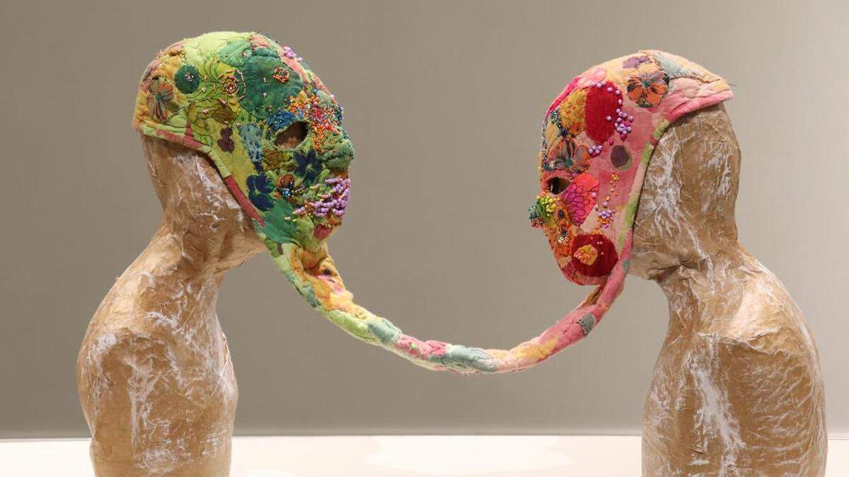 Linda Hall’s “Together but Separate” is one of many sculptural pieces and paintings now displayed in exhibits at the Museum of Arts and Sciences on Forsyth Road. Among various subjects and themes, Hall’s piece and several others reflect artists’ interpretations of life under COVID-19.