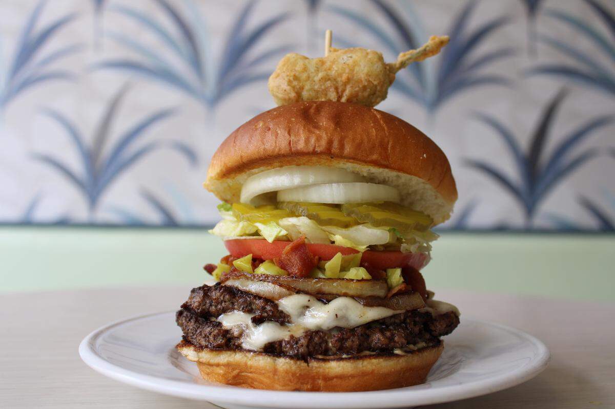 Macon Beer Company won the Most Beef Sales Award in the 2022 Macon Burger Week contest with its Mississippi Mouthful Burger.