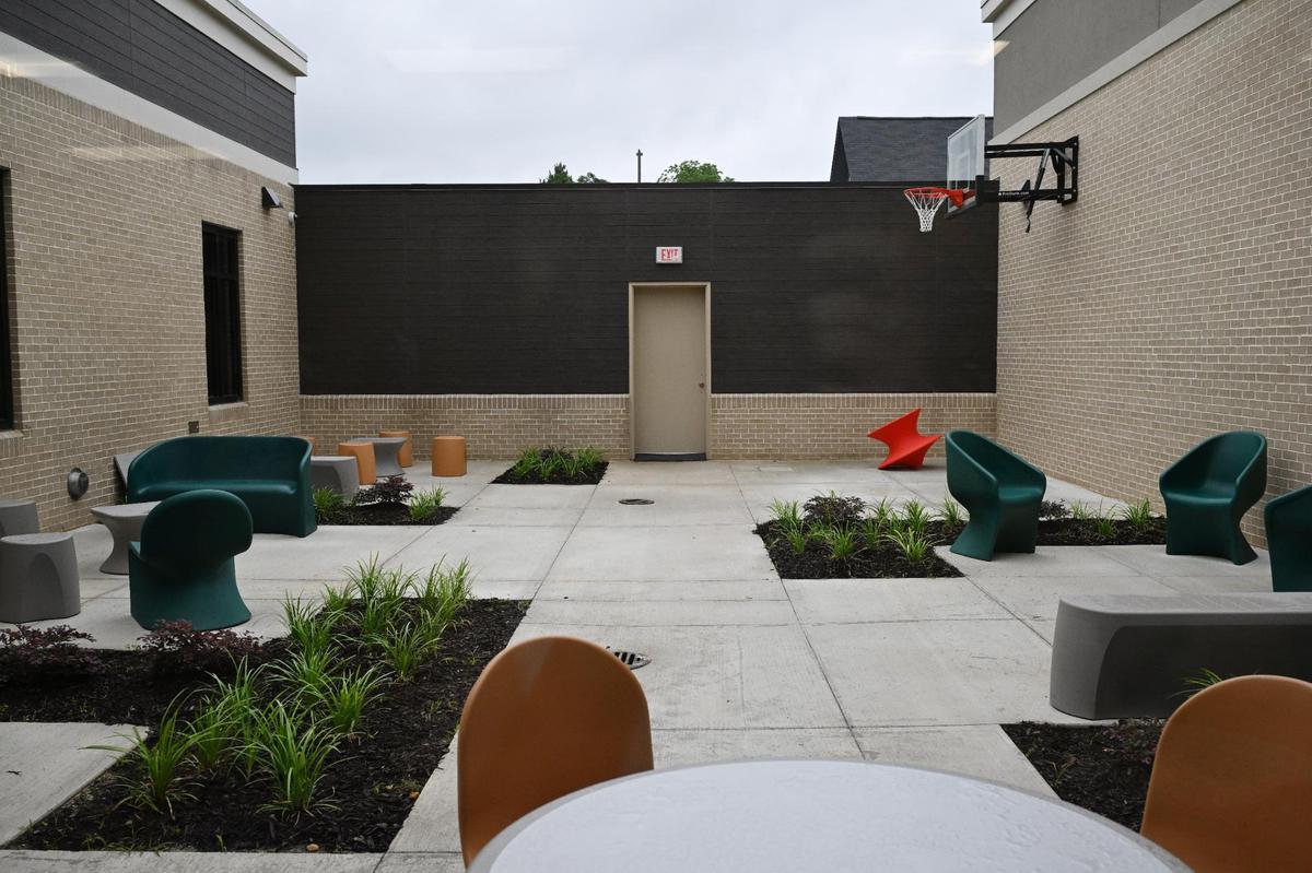 An outdoor seating and dining area sits off of River Edge Crisis Services and Diagnostic Center dining and living room on Thursday, June 5, 2025, in Macon, Georgia. River Edge is expecting to begin accessing patients this month, while Mercer’s outpatient side is expected to open later this summer.