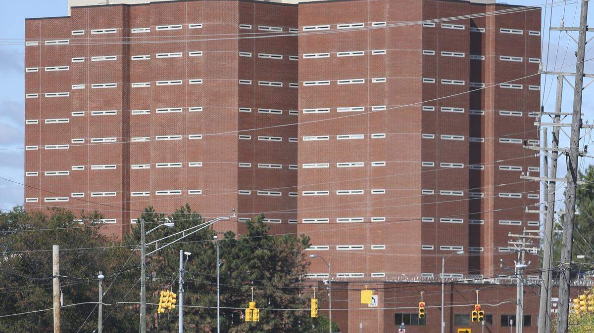 This Oct. 1, 2015 photo, shows the exterior of the Macomb County jail in Mount Clemens, Mich. A Michigan woman who says she was forced to give birth in the suburban Detroit jail is suing two years later over allegations her civil rights were violated.