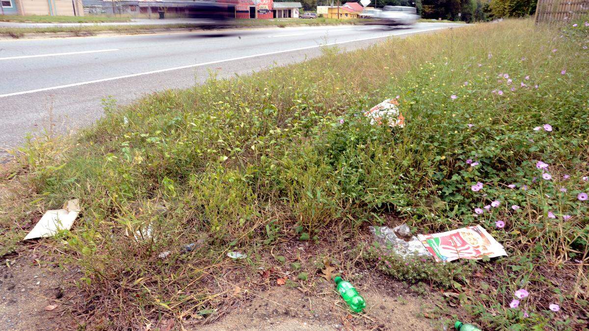 Trash lies along Emery Highway in Macon.