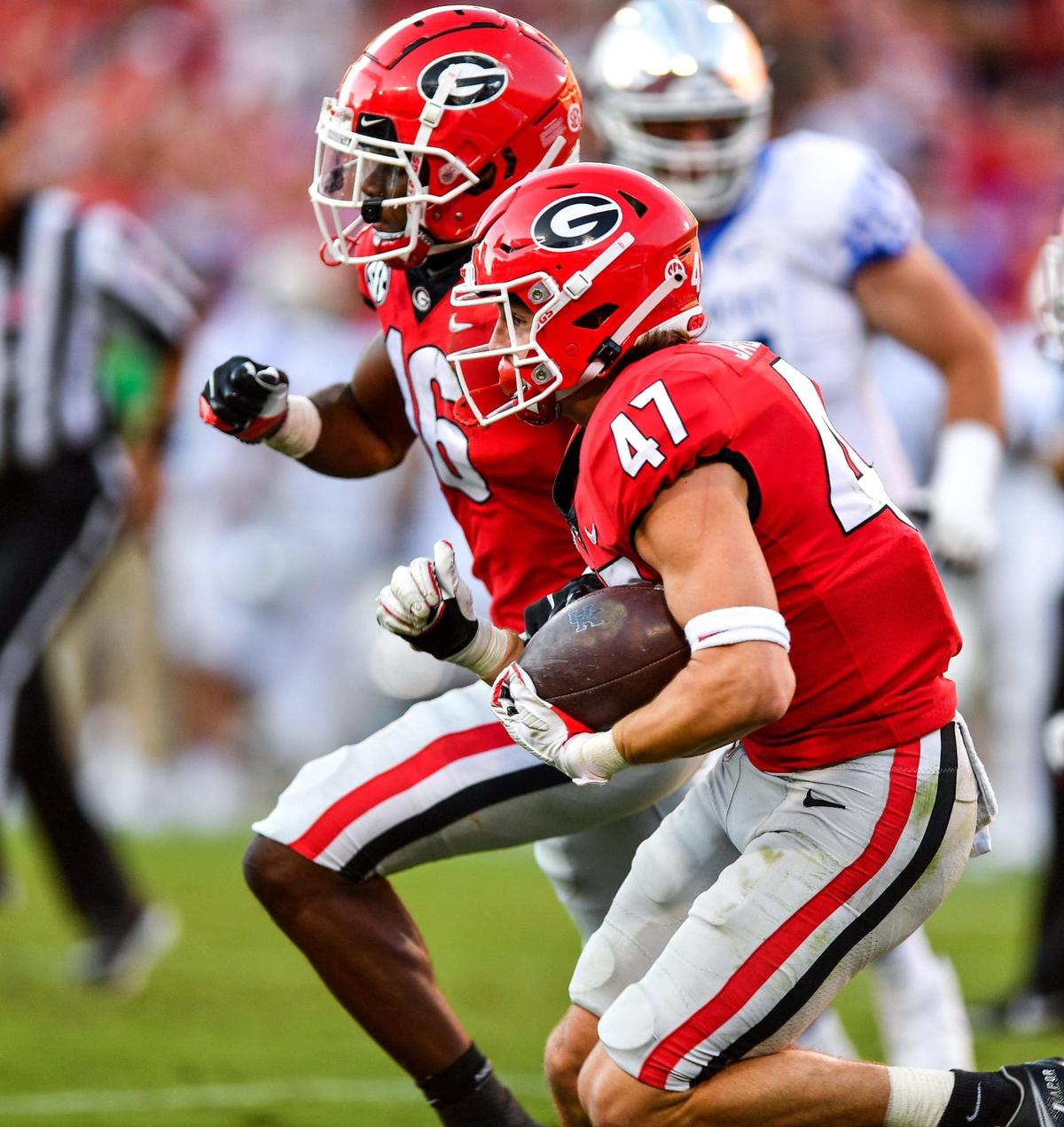 DONN RODENROTH,Athens, Georgia, 10/16/2021: Georgia defensive back Dan Jackson scoops up a blocked kick and heads up field Saturday as the Bulldogs rolled over Kentucky 30-13.