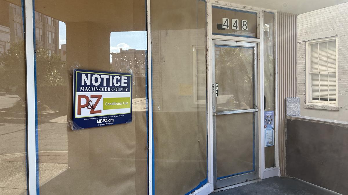 A conditional use notice is posted by Macon-Bibb County Planning & Zoning on Tuesday, Dec. 9, 2025, at the entrance of 448 Second Street in downtown Macon, Georgia. The P&Z Commission approved Monday for the former comic shop property to be used as Club Nirvana, a nightclub.