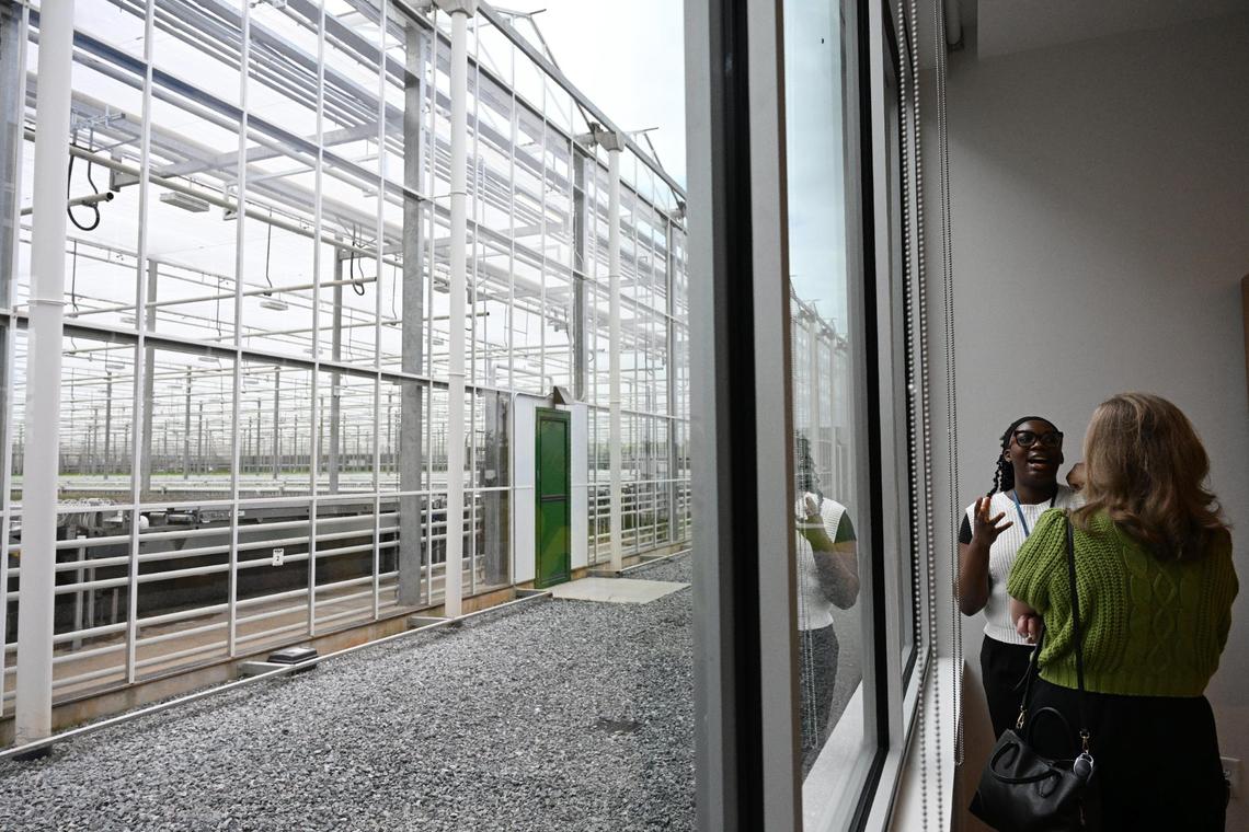 Nadia Norman (left) speaks with Sheila Duffner outside of the BrightFarms greenhouse grand opening on Thursday, June 5, 2025, in Macon, Georgia. The newest Brightfarms greenhouse held its grand opening Thursday, but the first harvest was in December.