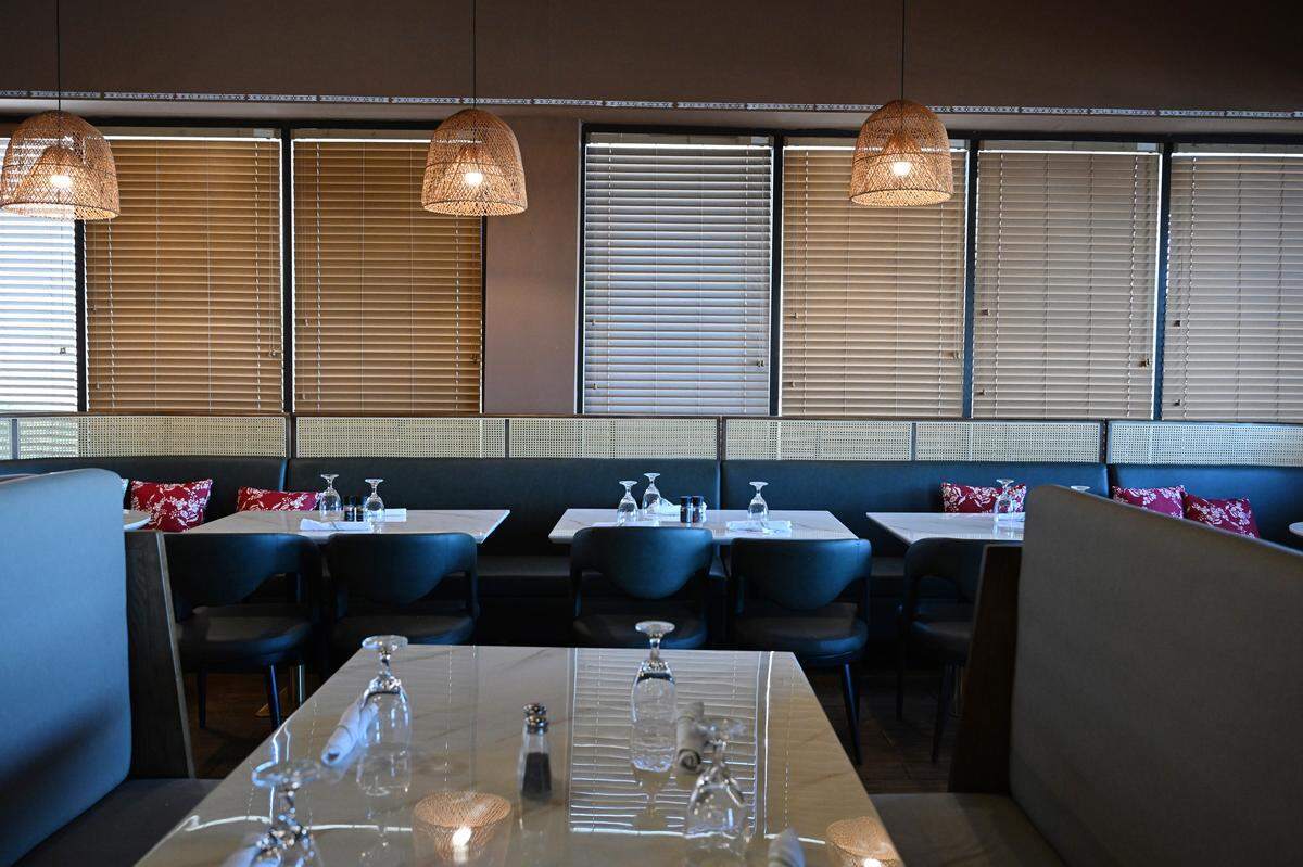 New hanging lamps, booths and tables inside of 7 Spices Authentic Indian Restaurant & Bar in Warner Robins.