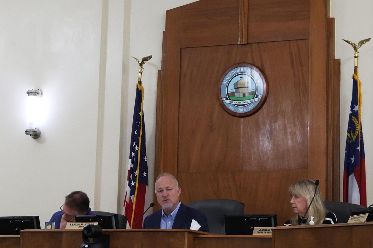 Macon-Bibb County Mayor Lester Miller (middle) speaks during an update on progress made in the Macon Violence Prevention plan during a Board of County Commissioners pre-commission meeting on Tuesday, March 4, 2025, at Macon City Hall in Macon, Georgia. The Macon Violence Prevention plan aims to find solutions to reduce violent crime and strengthen community in Macon. It is evaluated annually by local law enforcement and government.