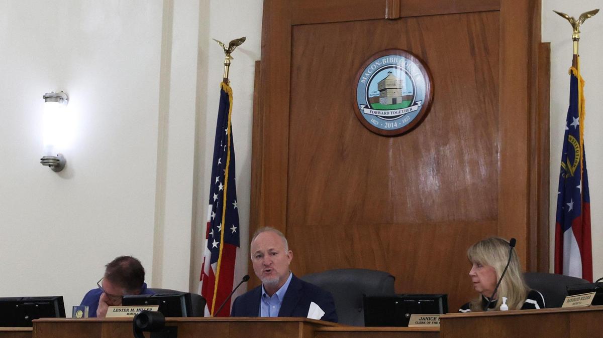 Macon-Bibb County Mayor Lester Miller (middle) speaks during an update on progress made in the Macon Violence Prevention plan during a Board of County Commissioners pre-commission meeting on Tuesday, March 4, 2025, at Macon City Hall in Macon, Georgia. The Macon Violence Prevention plan aims to find solutions to reduce violent crime and strengthen community in Macon. It is evaluated annually by local law enforcement and government.