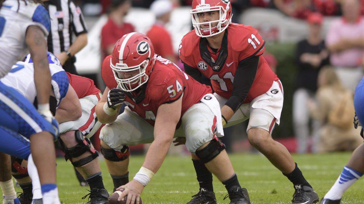 Georgia quarterback Greyson Lambert (11) won 10 games as a starter last year/Philip Williams