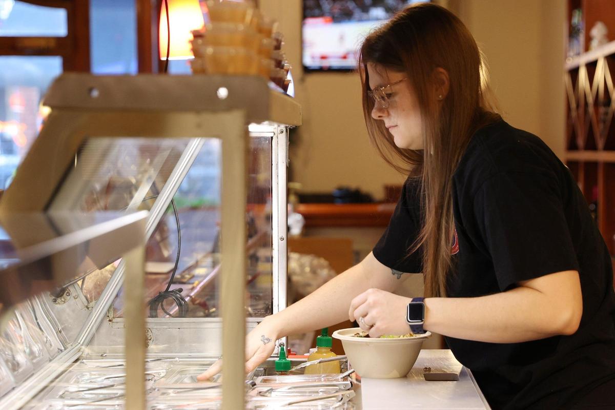 Gangnam Grill co-owner Ciara Chung completes a class bibimbap on Tuesday, Jan. 14, 2024, at Gangnam Grill in downtown Macon, Ga. The new casual, fast paced Korean restaurant sits in the space where Ninja Steakhouse and Sushi used to be, but with the same ownership.