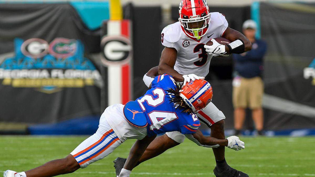 Georgia Running Zamir White breaks a tackle on his way to a first down against the Florida Gators Saturday in Jacksonville.