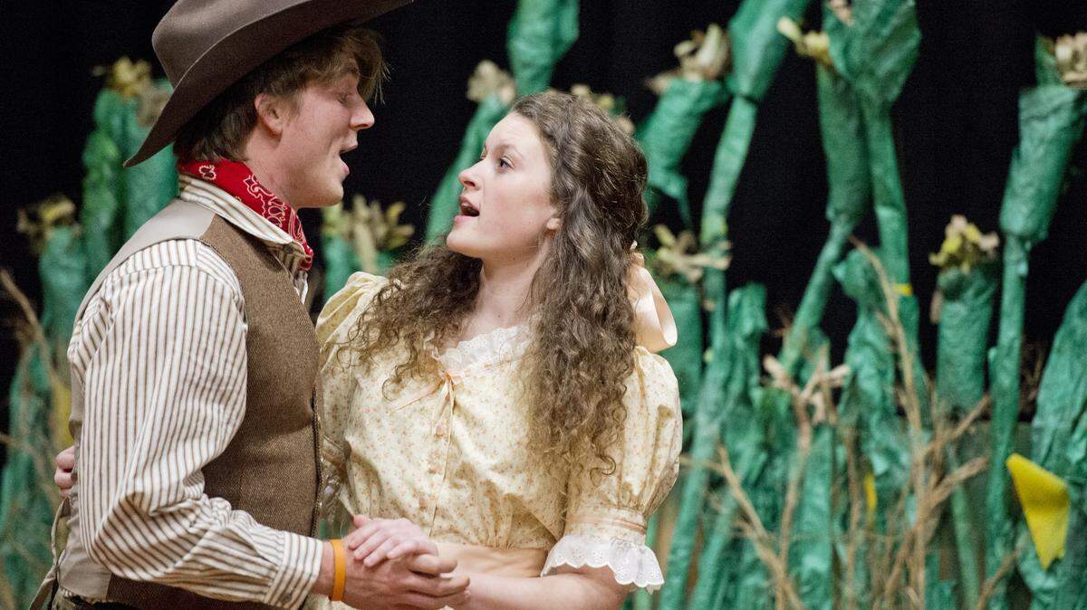 JASON VORHEES/THE TELEGRAPHClay Mote plays Curly and Mary Lathem is Laurey in Mercer University Opera's production of "Oklahoma!"