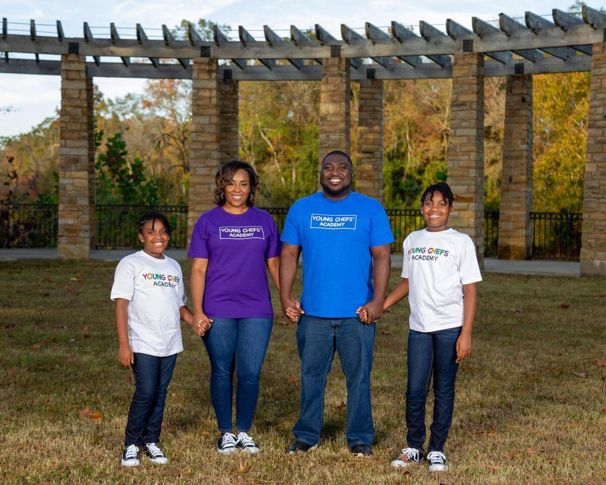 Daphne and Tarell Register, owners of the Young Chefs Academy franchise to open in Warner Robins, with their children, Mckenzie, 9, and Raven, 10.
