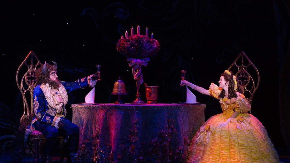 The Beast and Belle share a toast in the Broadway adaptation of “Disney’s Beauty and the Beast,” which will be performed Oct. 8 at the Grand Opera House.