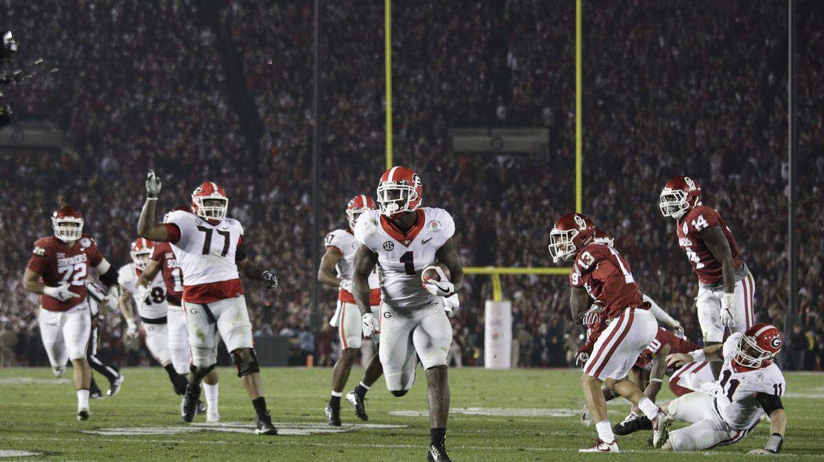 Georgia running back Sony Michel (1) carries the ball to score a touchdown in overtime against Oklahoma in the Rose Bowl on Jan. 1 in Pasadena, Calif. Georgia won 54-48.