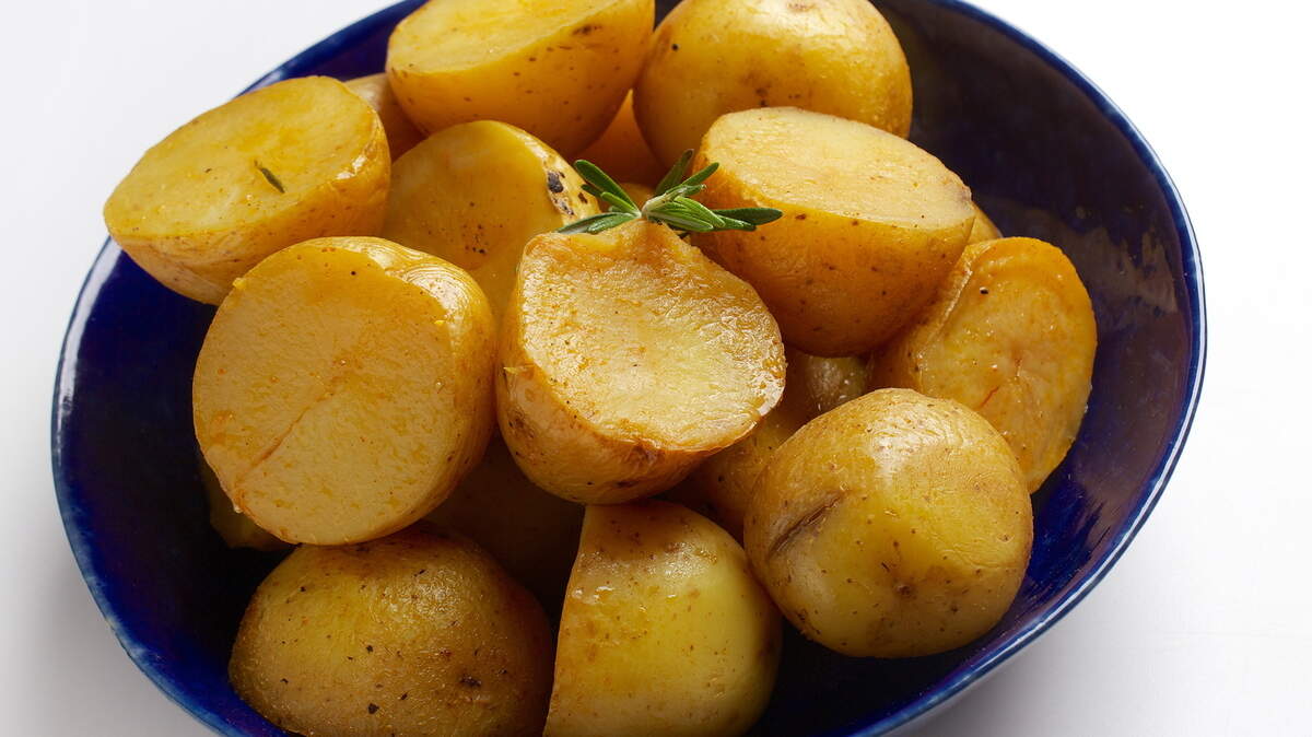 Easter is so early this year -- and comes on the heels of one seriously chilly winter. Citrus, honey, mustard, rosemary and a touch of curry grace this easy side dish -- Annaís Greek Potatoes.