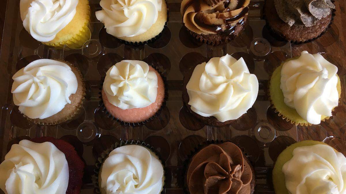 These are 12 flavors of cupcakes available at Felicia’s Cake Factory, including carrot cake, peanut butter, and their signature almond.