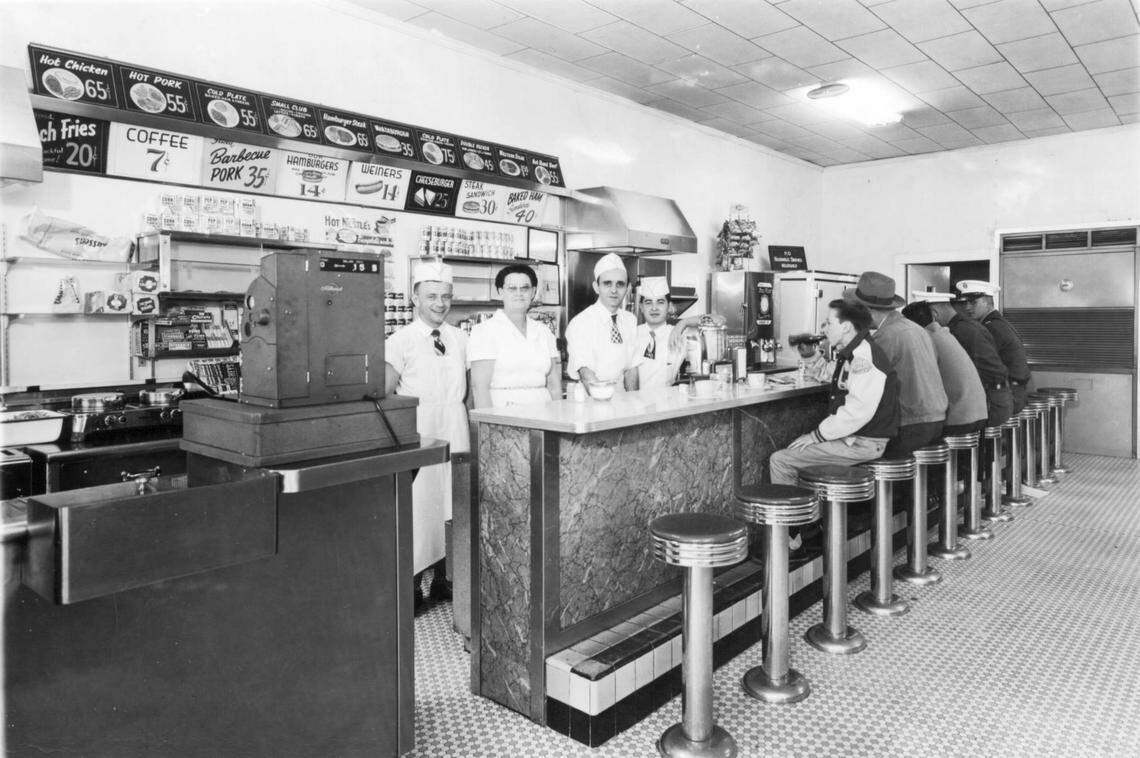In an undated photo, customers dine at the original Nu-Way Weiners restaurant which opened in 1916.