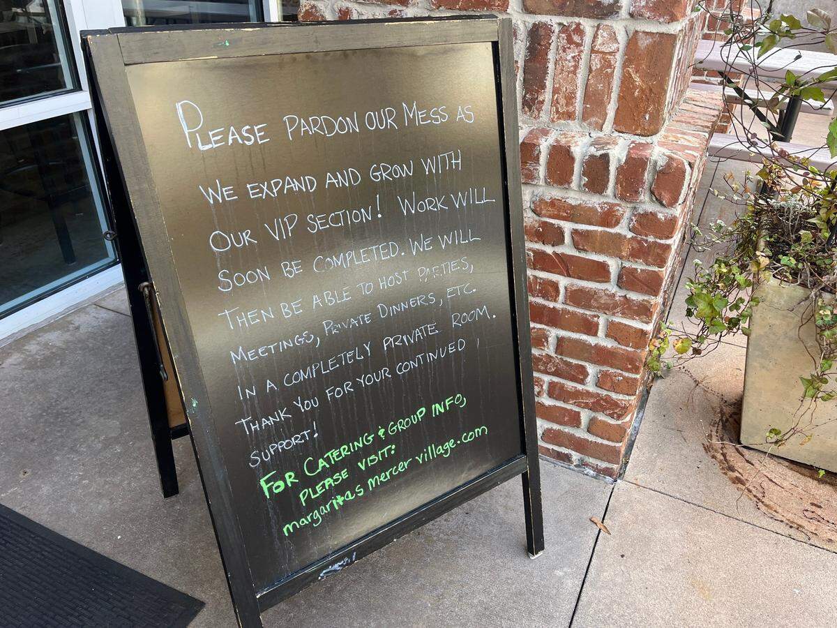 A chalkboard sign propped up in front of Margaritas Mexican Grill in Macon, Ga.’s Mercer Village notified customers of renovations happening inside on Friday, Feb. 14, 2025. The restaurant expanded into where Bear Burgers used to be.