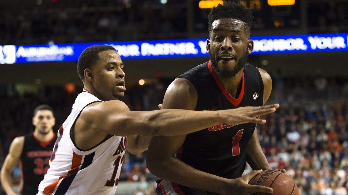 Auburn's Desean Murray, shown here guarding Georgia's Yante Maten, is leaving the Tigers after two years with the program.