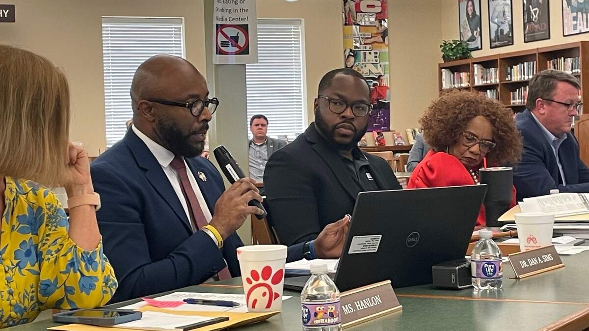 Bibb County Schools Superintendent Dan Sims, second from right, made no specific recommendations to the board regarding the millage rate.