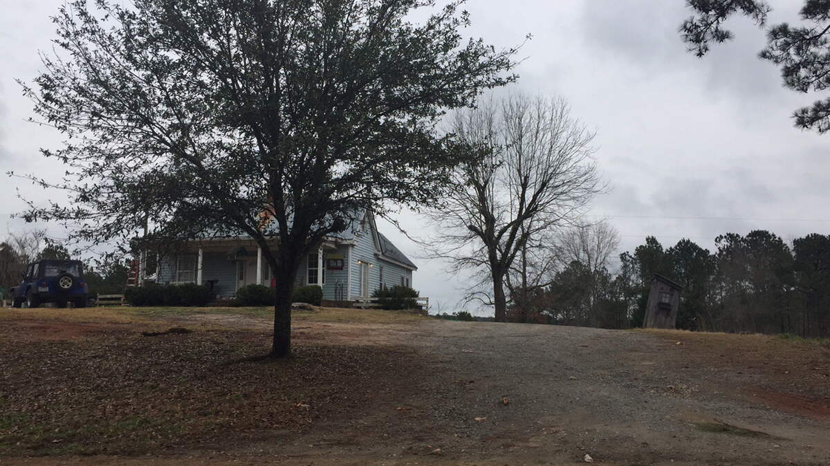 Woodard was shot outside this home on Barron Russell Road.